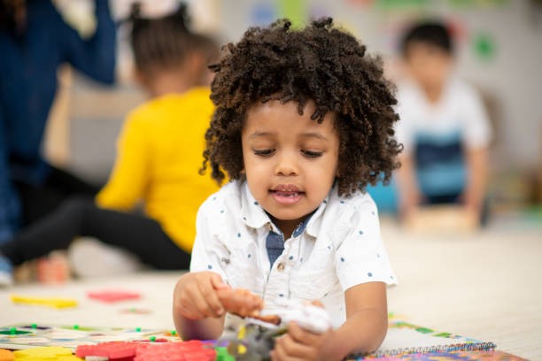 Child plaing with toy